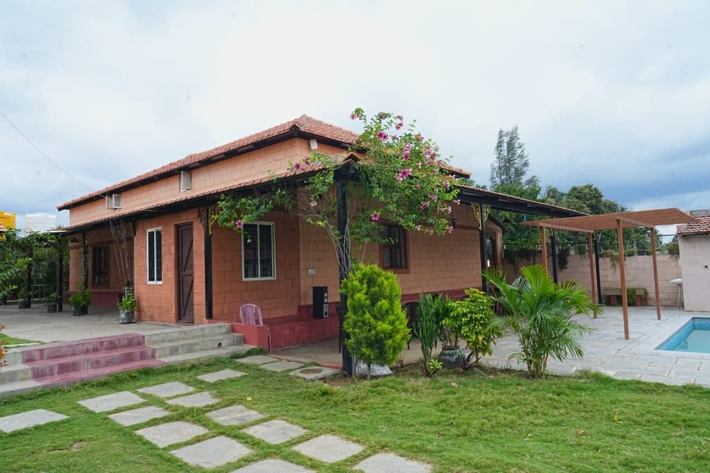Scenic resort bungalow, lawn and poolside at Shree Adventure